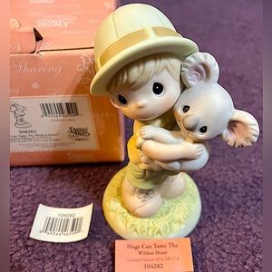 Precious Moments LIMITED ED. "Hugs Can Tame the Wildest Heart" Figurine, #104282